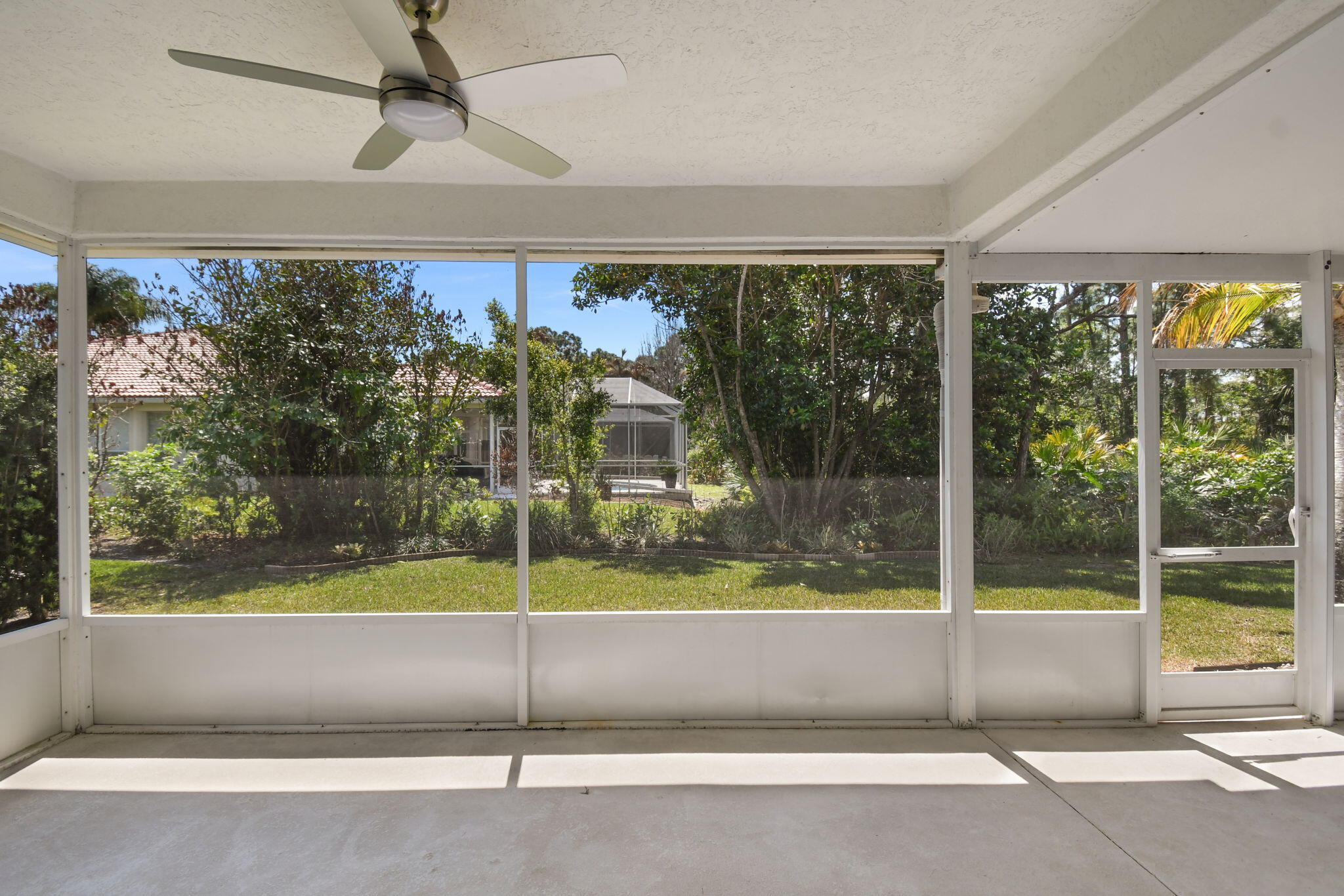 6785 Southeast Warwick Lane Stuart, FL 34997 - Photo 27 of 62 LARGE SCREENED LANAI
