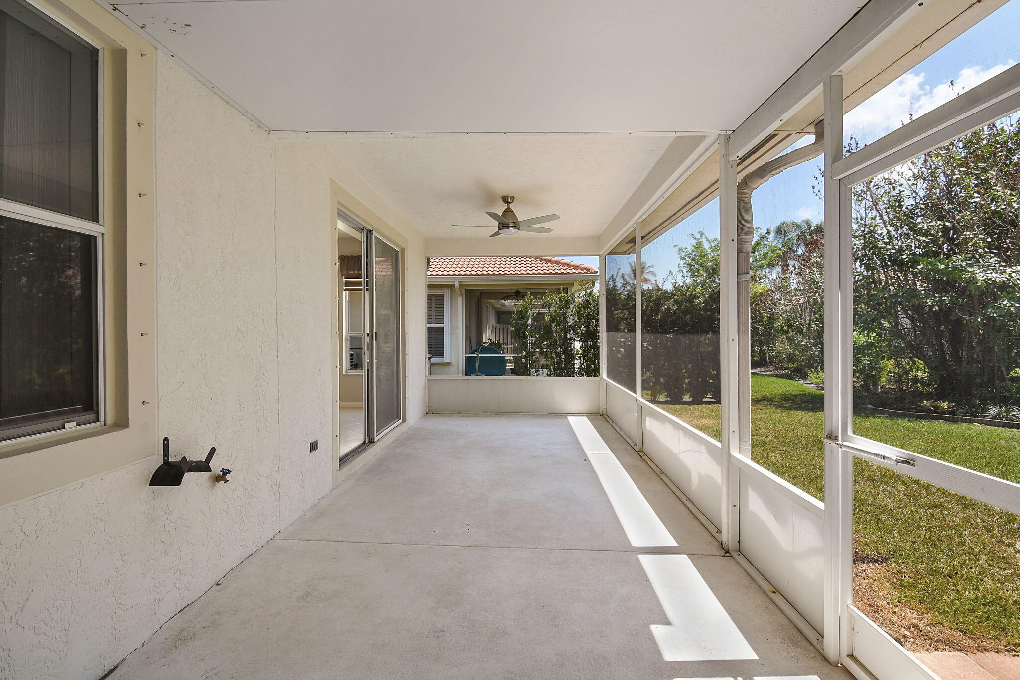 6785 Southeast Warwick Lane Stuart, FL 34997 - Photo 29 of 62 a view of an entryway with floor to ceiling windows