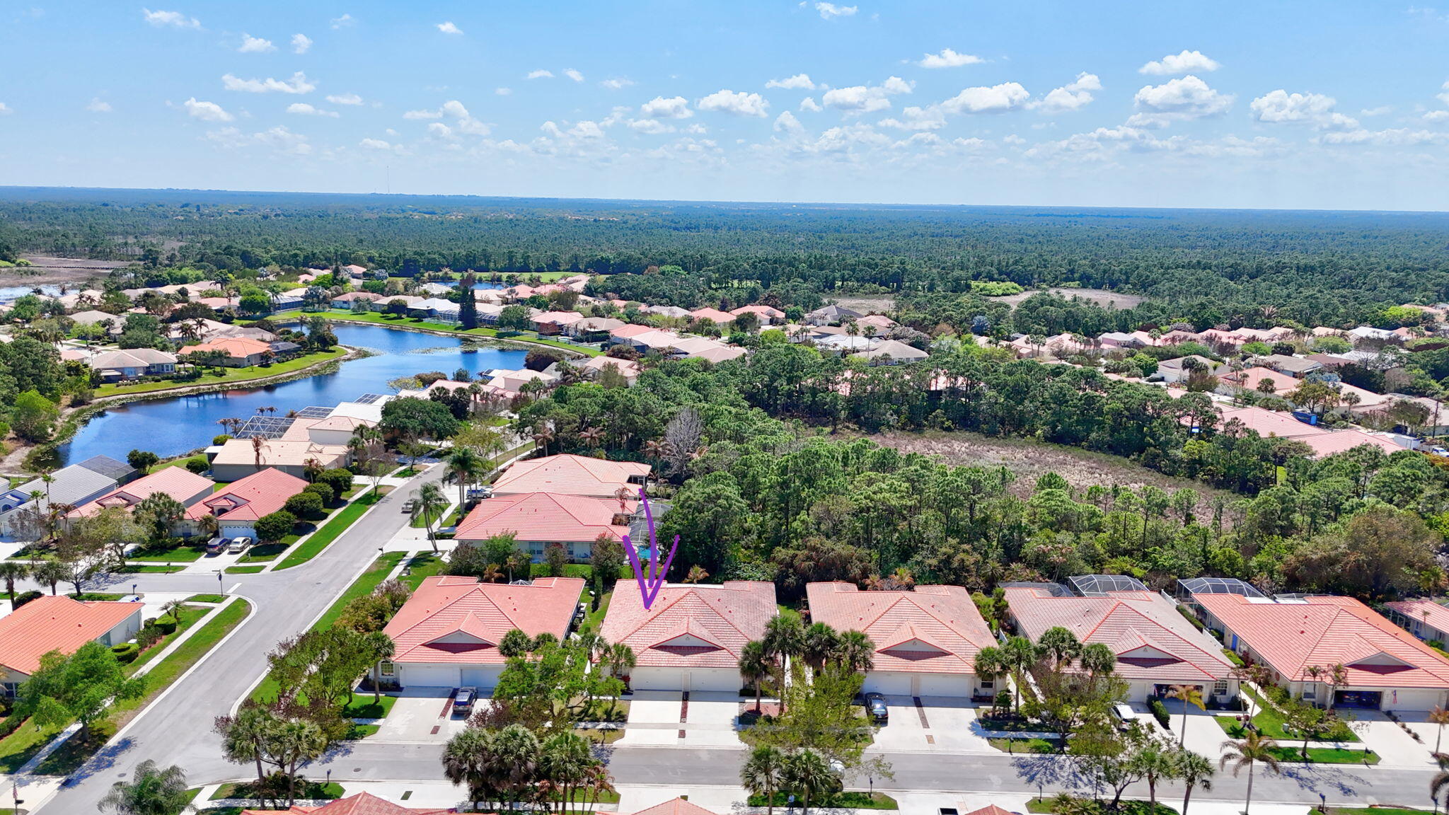 6785 Southeast Warwick Lane Stuart, FL 34997 - Photo 36 of 62 an aerial view of residential houses with outdoor space