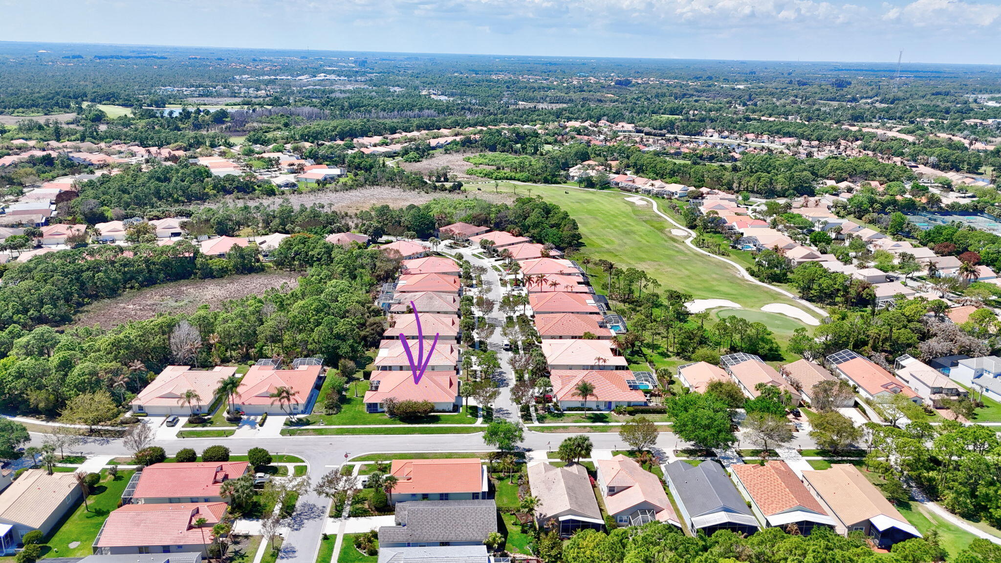 6785 Southeast Warwick Lane Stuart, FL 34997 - Photo 47 of 62 an aerial view of residential houses with outdoor space