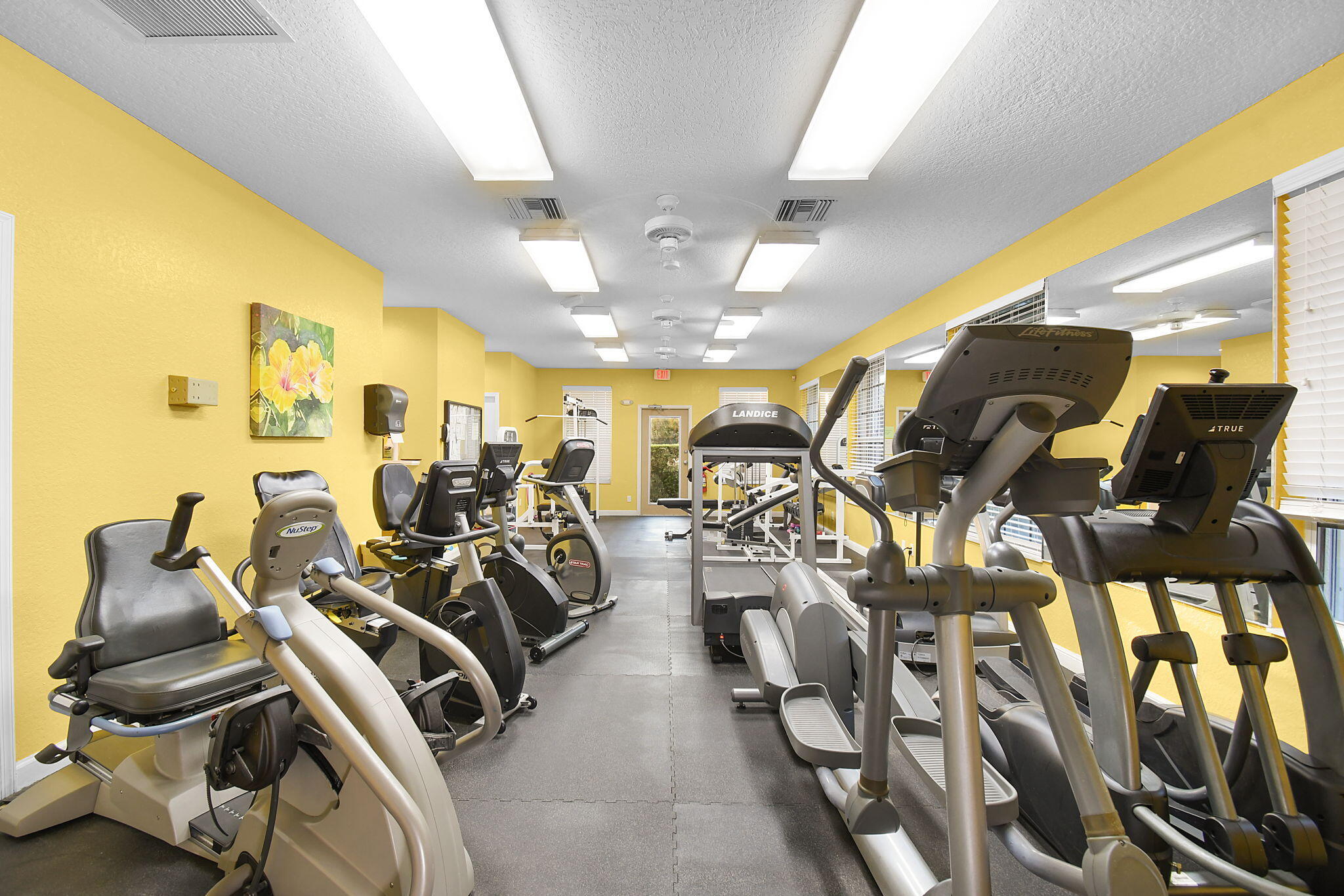 6785 Southeast Warwick Lane Stuart, FL 34997 - Photo 55 of 62 a view of a room with gym equipment