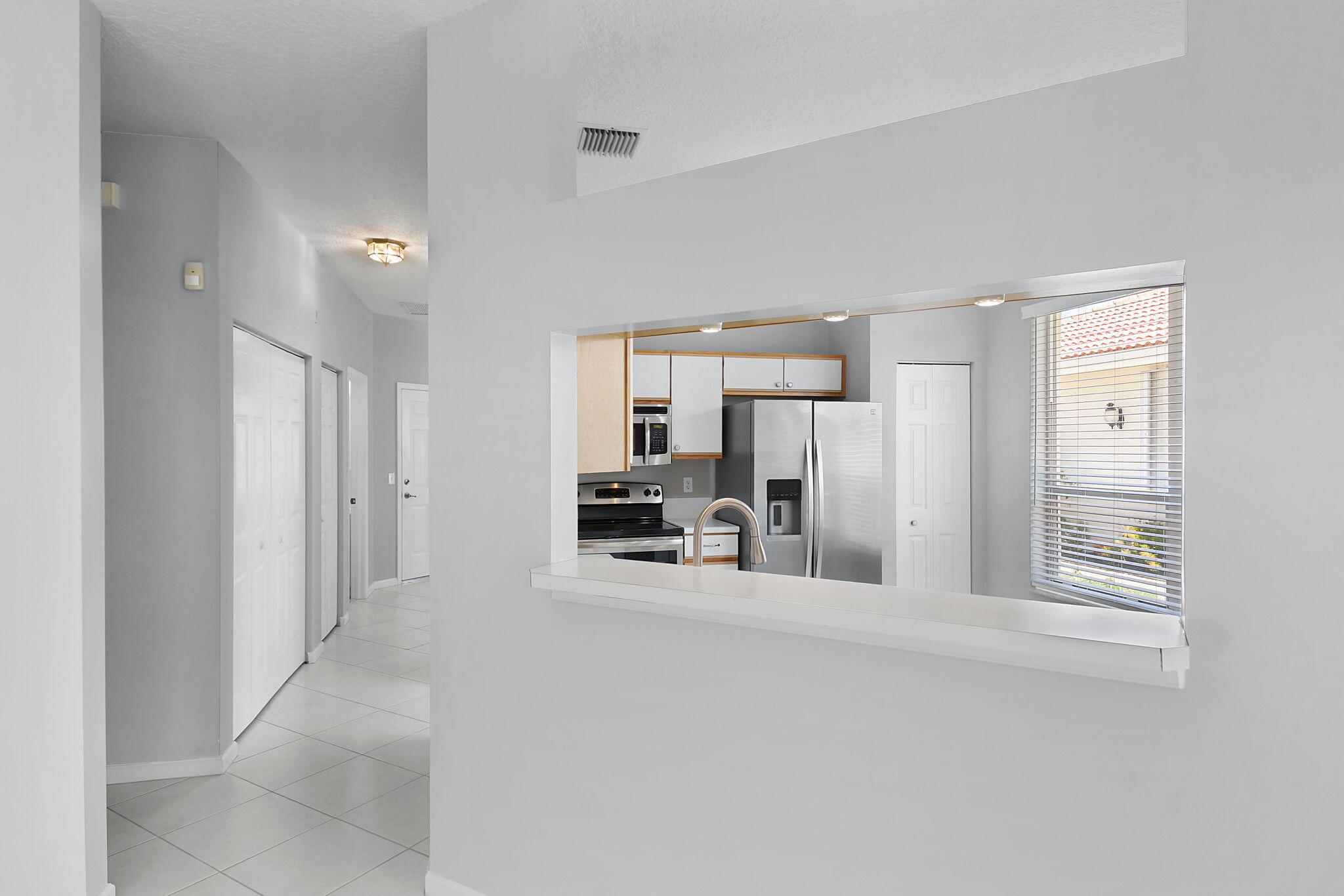 6785 Southeast Warwick Lane Stuart, FL 34997 - Photo 10 of 62 a view of a livingroom with a furniture