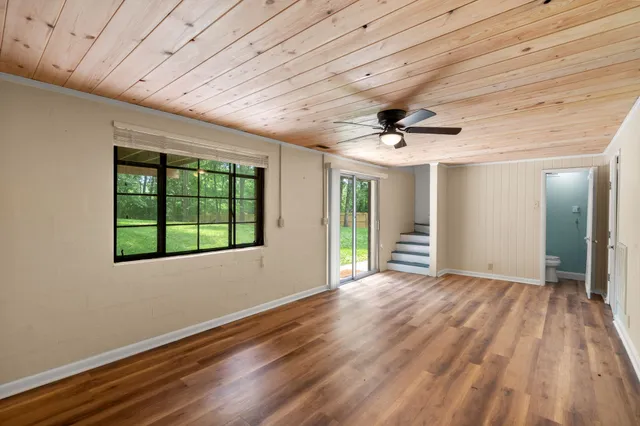 a view of an empty room with a window