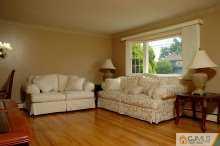 16 Finley Road Edison, NJ 08817 - Photo 2 of 6 a living room with furniture and a large window