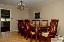 16 Finley Road Edison, NJ 08817 - Photo 3 of 6 a view of a dining room with furniture and chandelier