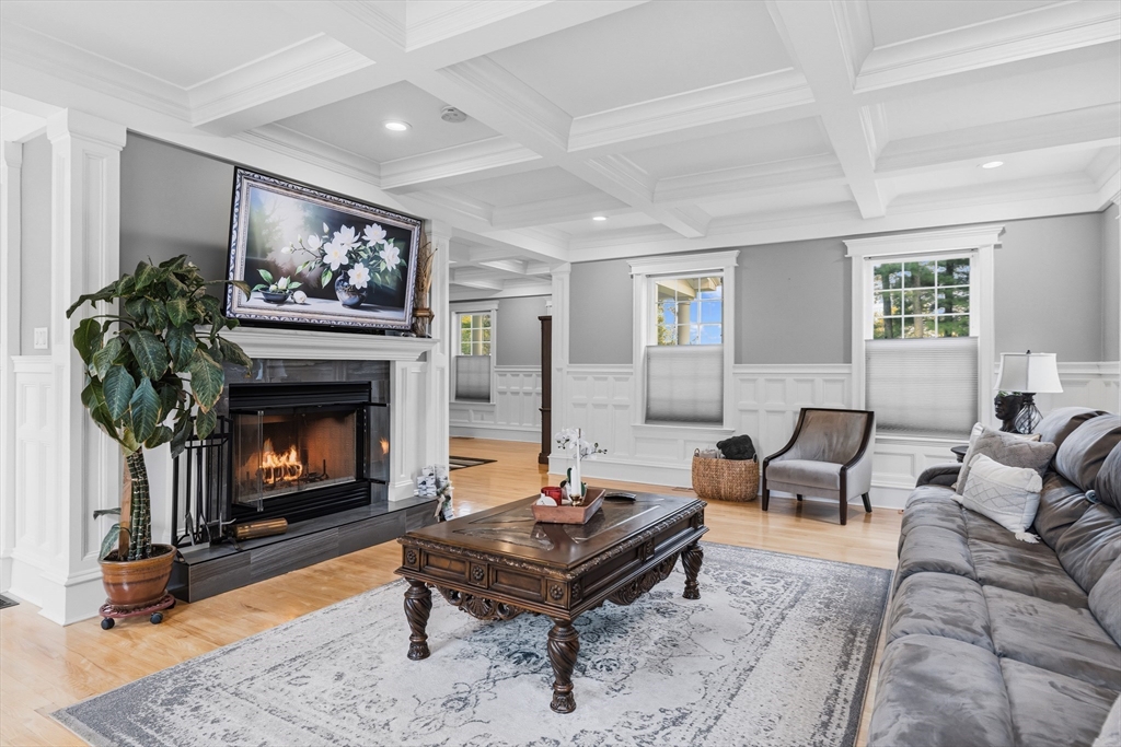 35 High Street Freetown, MA 02702 - Photo 11 of 40 a living room with furniture a fireplace and window
