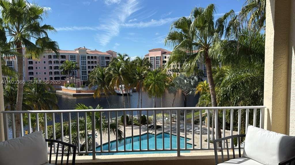 711 Crandon Boulevard, Unit 401 Key Biscayne, FL 33149 - Photo 14 of 33 a view of a balcony with wooden floor