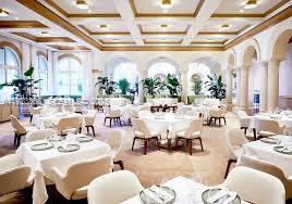 711 Crandon Boulevard, Unit 401 Key Biscayne, FL 33149 - Photo 23 of 33 a living room with lots of white furniture and a large window