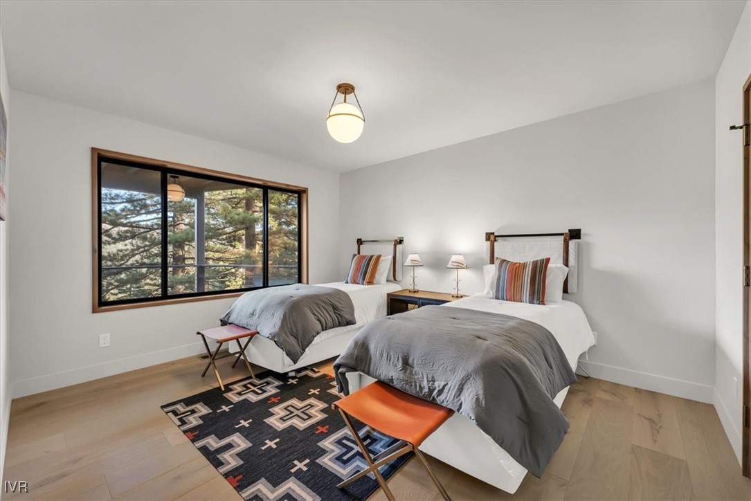 877 Tyner Way Incline Village, NV 89451 - Photo 31 of 43 a bedroom with two beds and a window