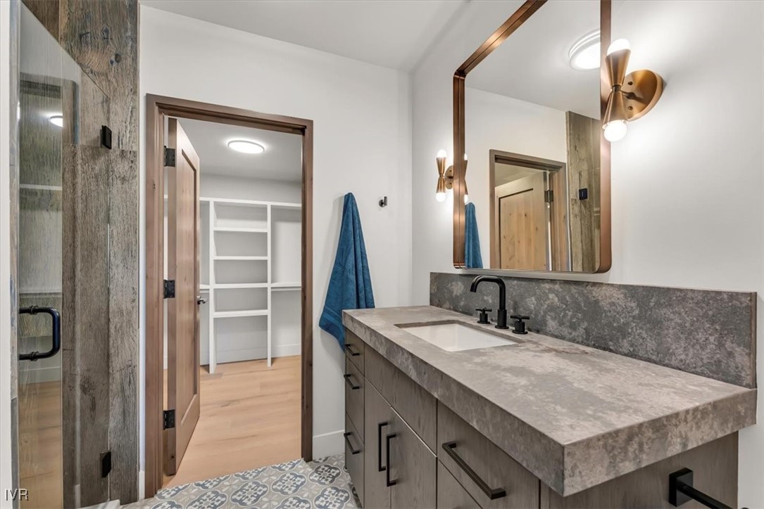 877 Tyner Way Incline Village, NV 89451 - Photo 32 of 43 a bathroom with a sink vanity and a mirror