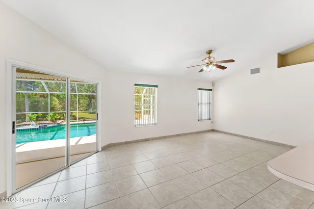 a view of a livingroom with a large window