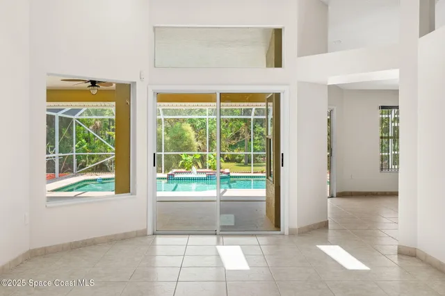 a bathroom with a tub a sink and a shower