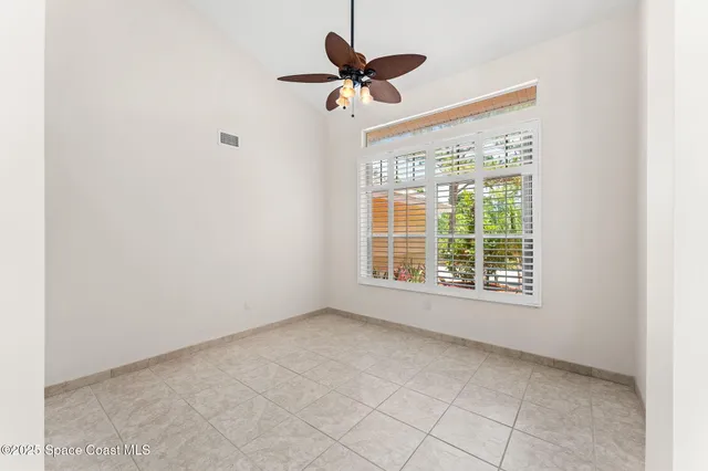 a large kitchen with stainless steel appliances granite countertop a sink and cabinets