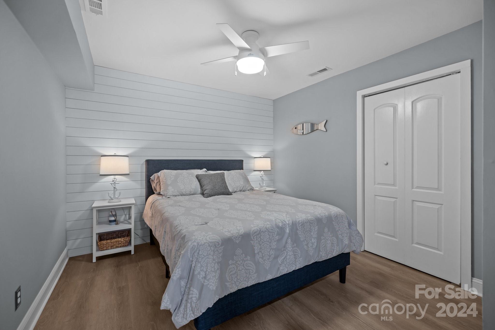 55 Ridgeport Road Lake Wylie, SC 29710 - Photo 26 of 45 a bedroom with a bed and a night stand