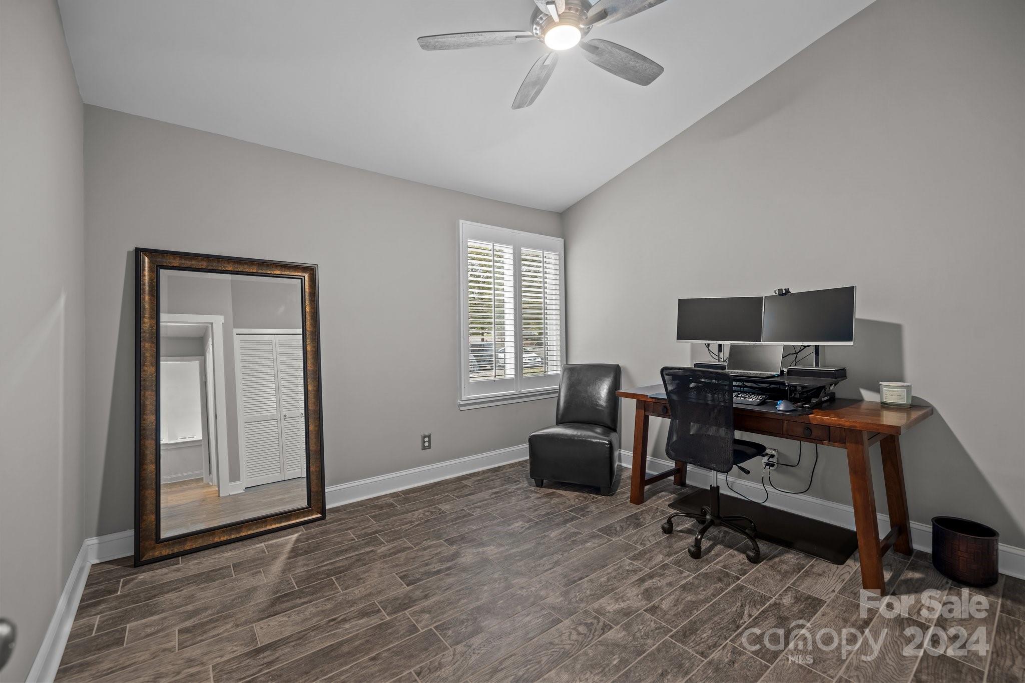 55 Ridgeport Road Lake Wylie, SC 29710 - Photo 27 of 45 a view of a livingroom with workspace and a window