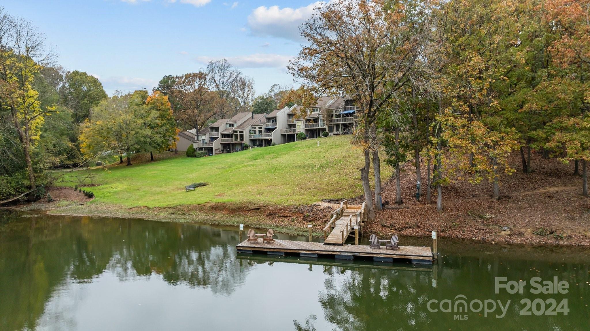 55 Ridgeport Road Lake Wylie, SC 29710 - Photo 3 of 45 a view of a lake with houses