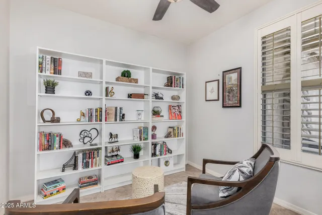 a room with furniture cabinets and a window
