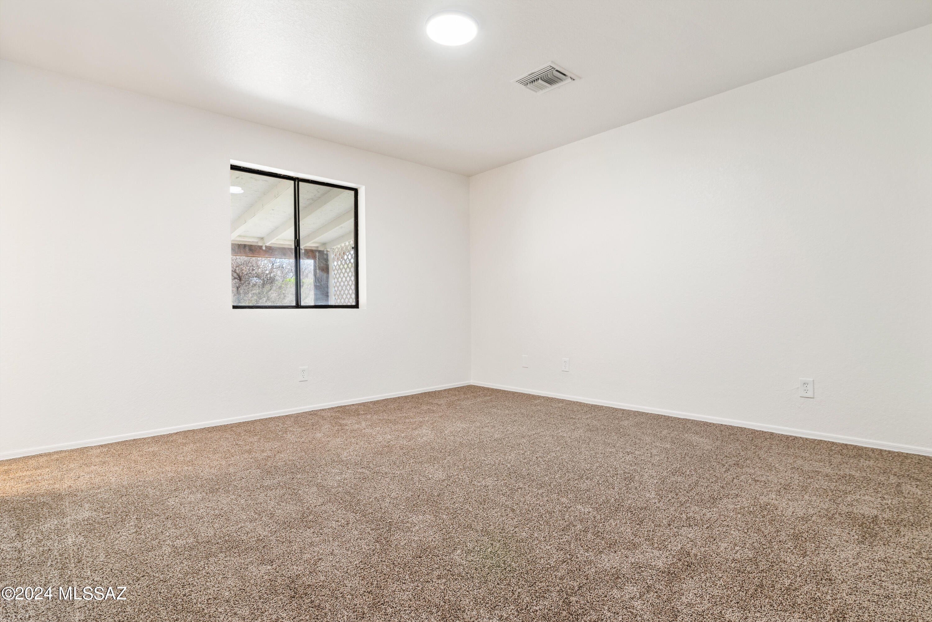 273 Harpo Court Rio Rico, AZ 85648 - Photo 22 of 34 an empty room with windows