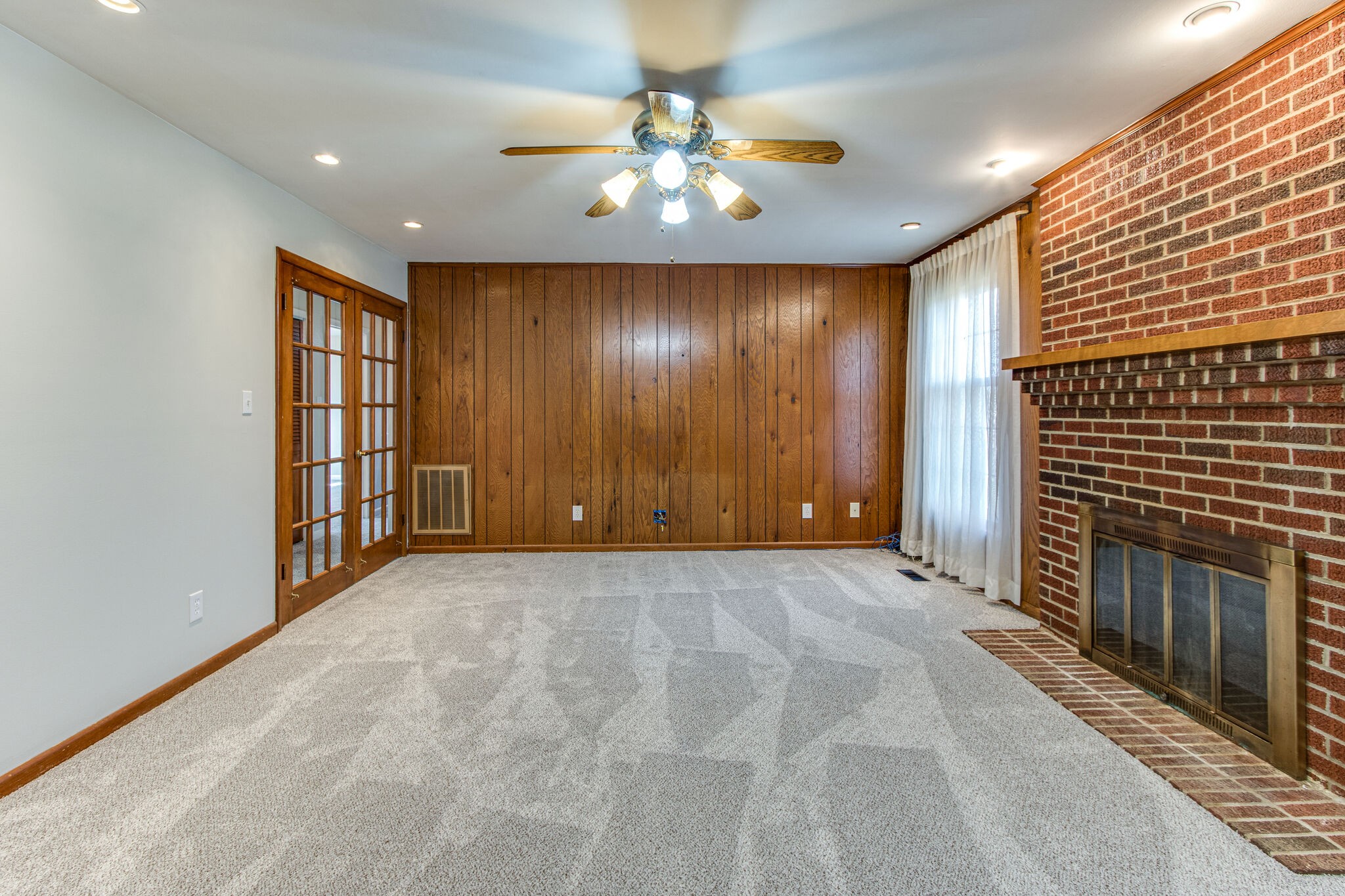 3083 Hickerson Road Manchester, TN 37355 - Photo 15 of 34 a view of an empty room with a fireplace