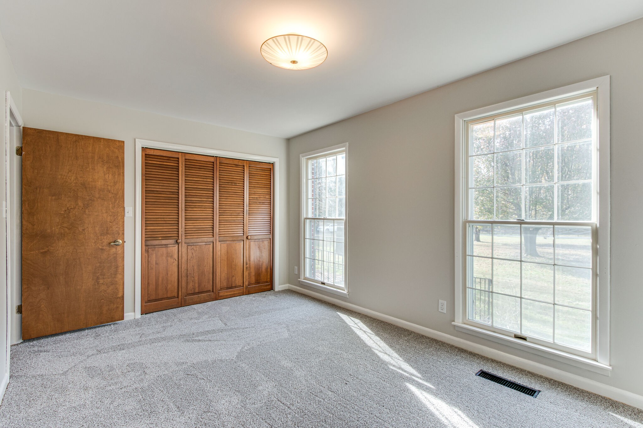 3083 Hickerson Road Manchester, TN 37355 - Photo 22 of 34 an empty room with windows