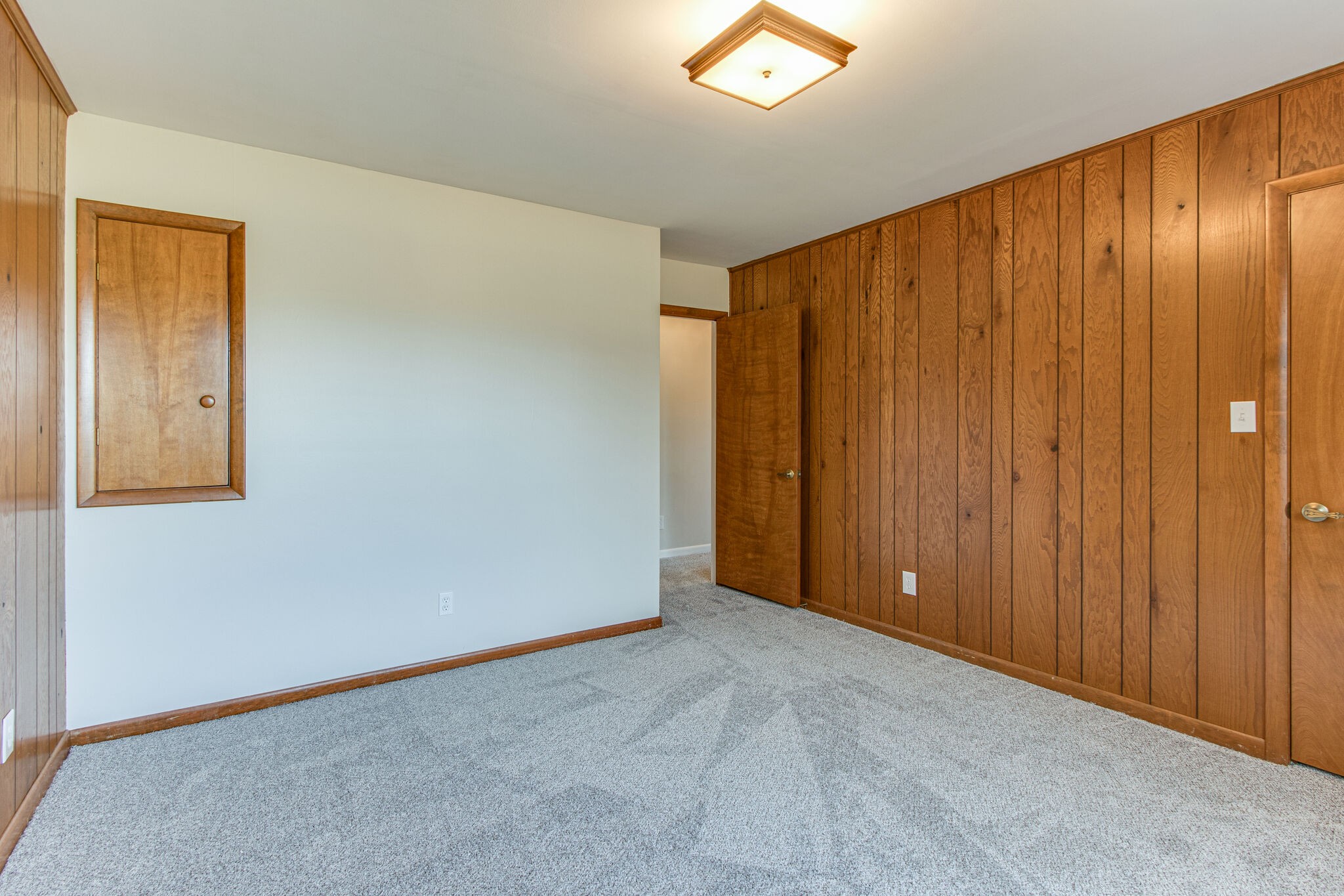 3083 Hickerson Road Manchester, TN 37355 - Photo 25 of 34 an empty room with a wooden door