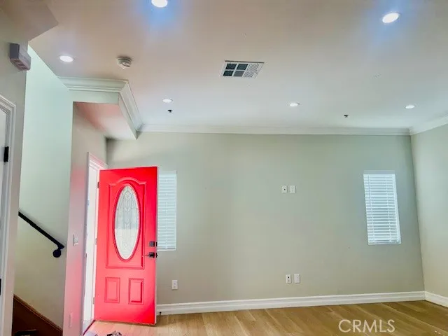 a kitchen with stainless steel appliances granite countertop a refrigerator stove and sink