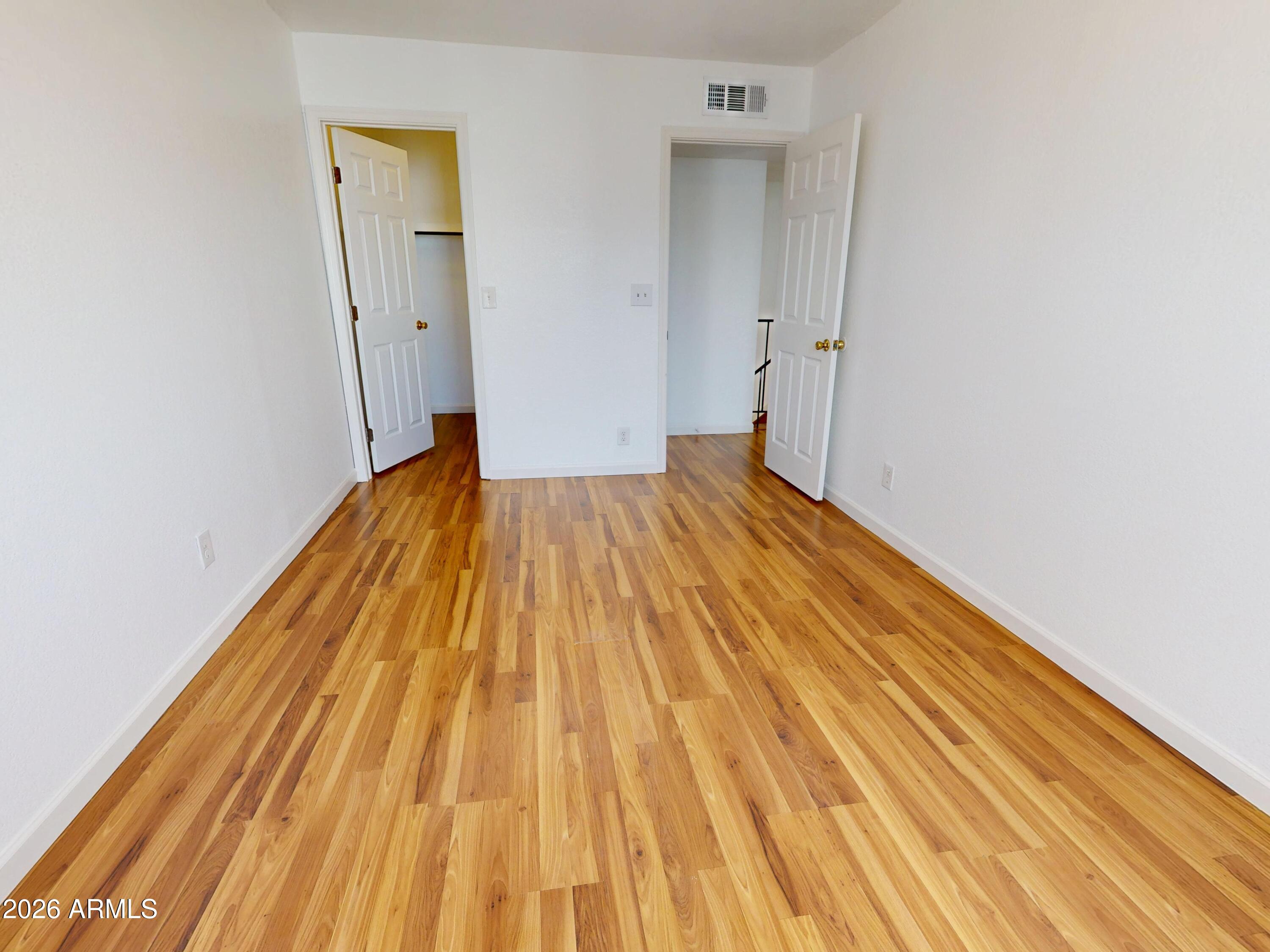 2629 West Ocotillo Road, Unit 2 Phoenix, AZ 85017 - Photo 7 of 21 2629-W-Ocotillo-Rd-Master-Bedroom