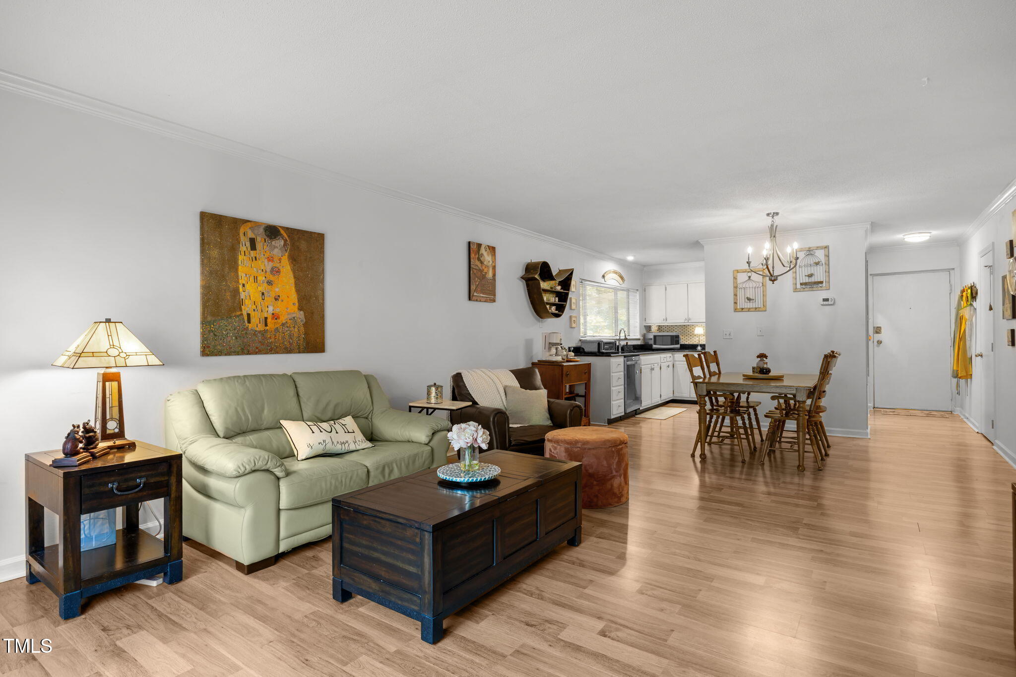 5024 Flint Ridge Place Raleigh, NC 27609 - Photo 19 of 46 Large living room filled with light makes this condo so attractive-and at a great price!