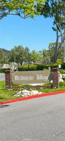 a view of road and houses with outdoor space