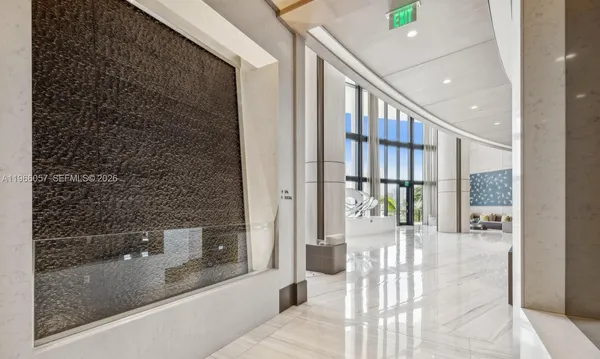 a view of livingroom with furniture and a flat screen tv
