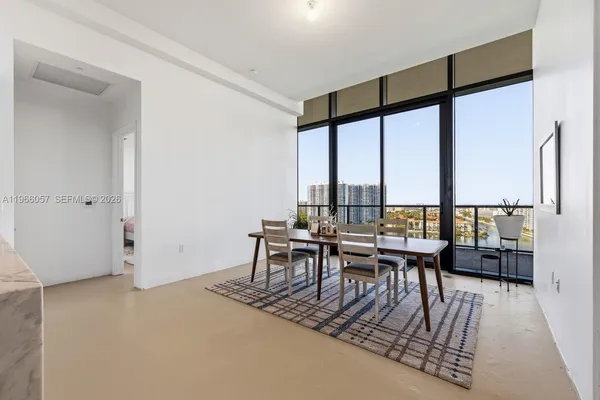 a bathroom with a double vanity sink toilet and shower
