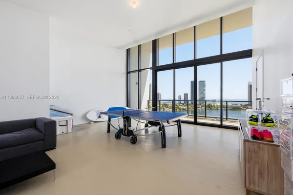a view of an outside dining space with furniture