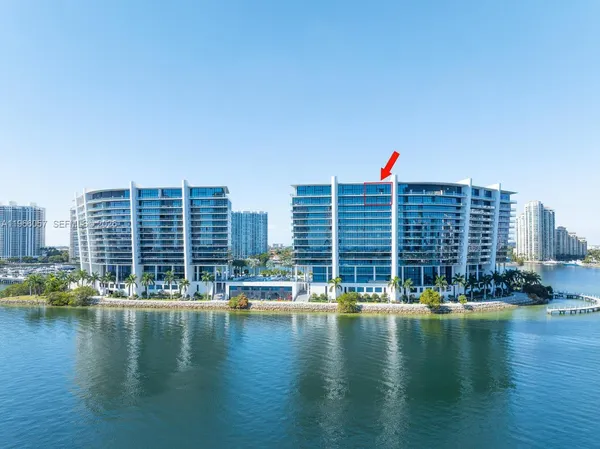 a view of a balcony with sitting area