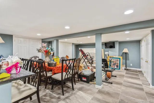 a view of a room with furniture and lots of equipment