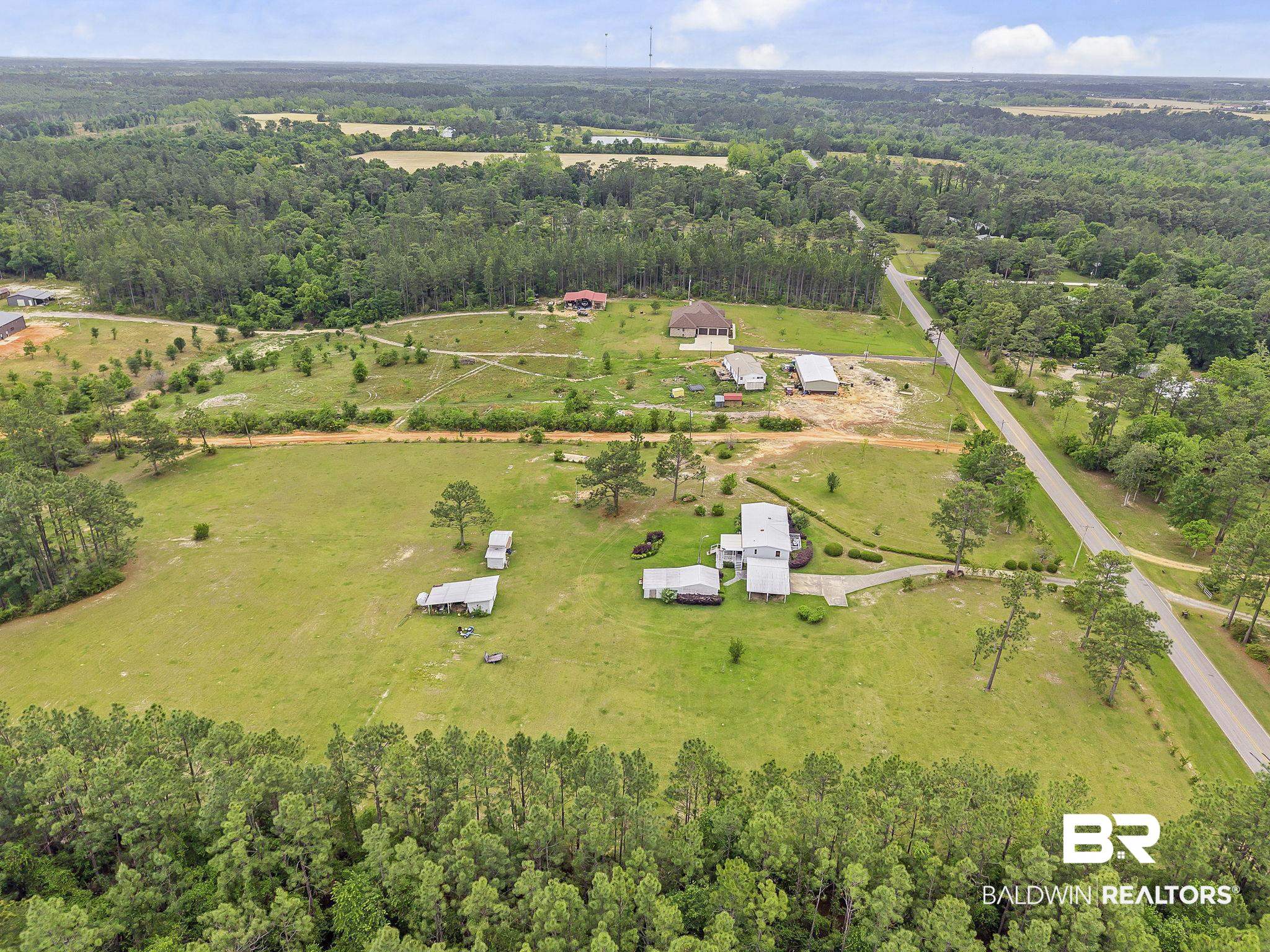 29792 County Road 65 Loxley, AL 36551 - Photo 28 of 39 Birds eye view of property featuring a rural view and a view of trees