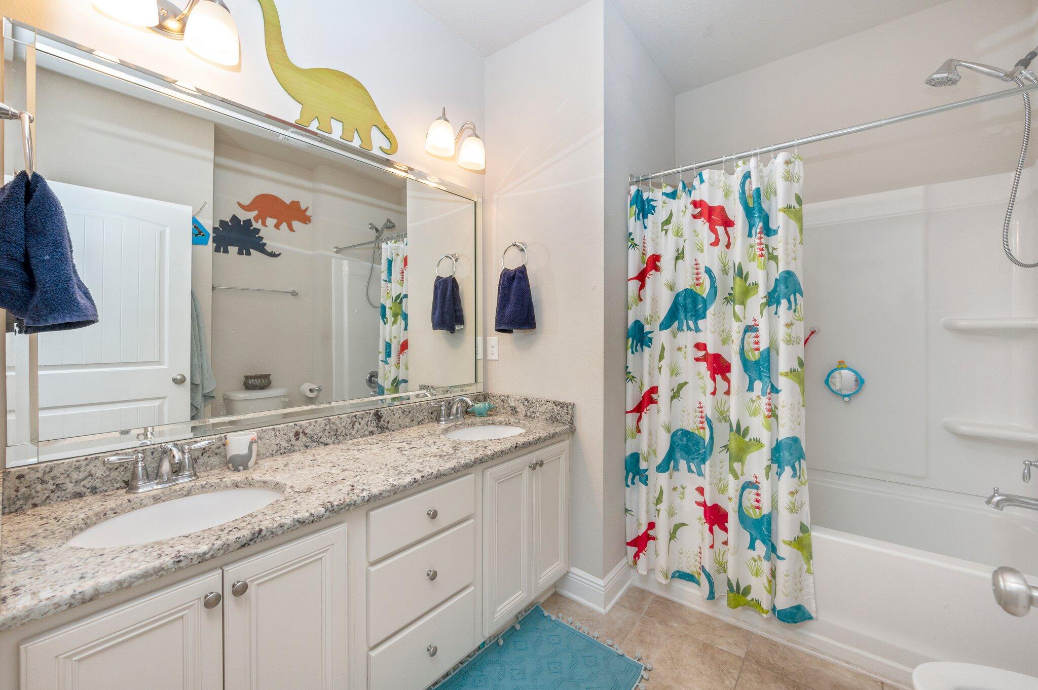 523 Gadwell Street Crestview, FL 32539 - Photo 21 of 30 a bathroom with a sink a vanity and a mirror
