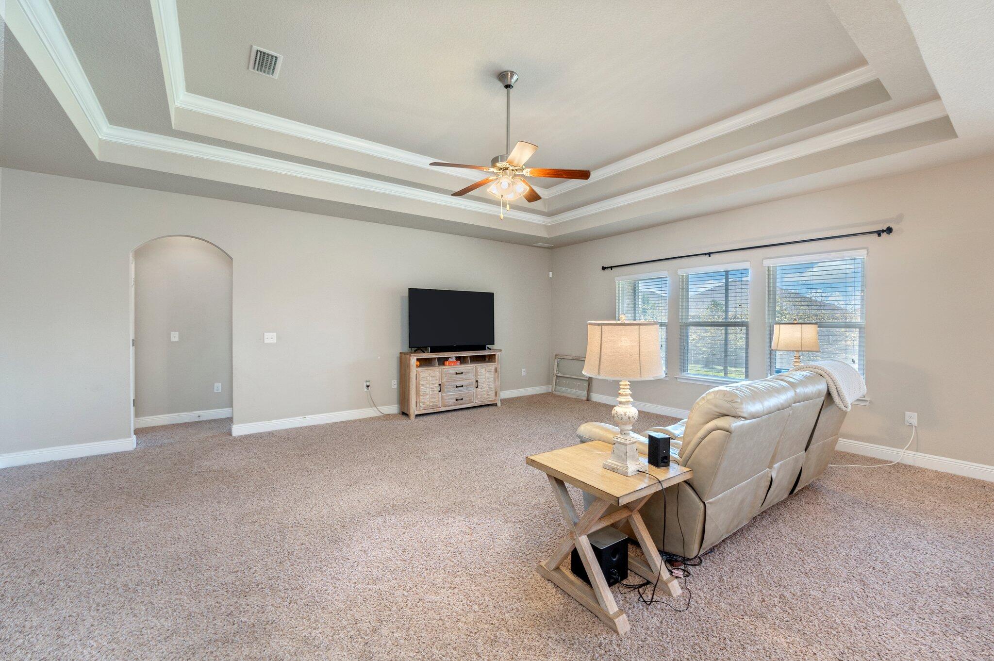 523 Gadwell Street Crestview, FL 32539 - Photo 4 of 30 a living room with furniture and a flat screen tv