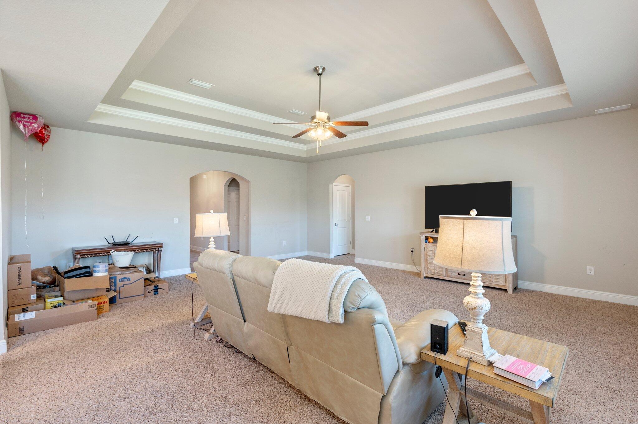 523 Gadwell Street Crestview, FL 32539 - Photo 5 of 30 a living room with furniture and a chandelier