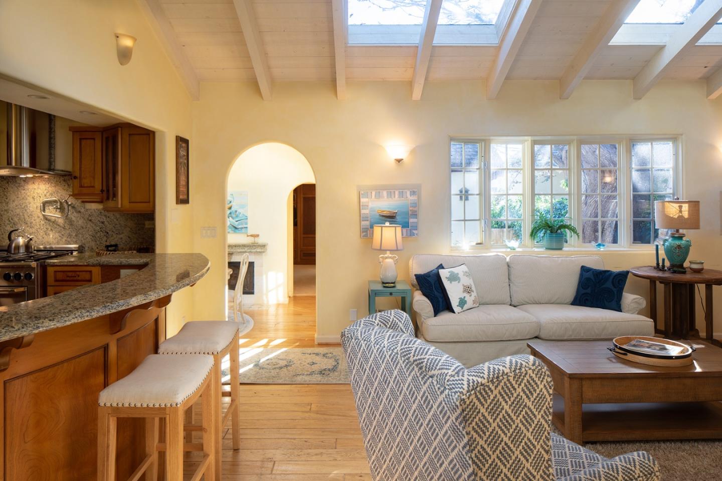 26335 Rio Avenue Carmel, CA 93923 - Photo 2 of 13 a living room with furniture and a large window