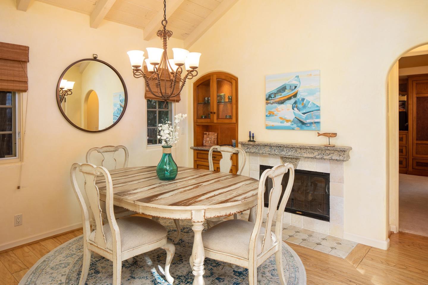 26335 Rio Avenue Carmel, CA 93923 - Photo 6 of 13 a view of a dining room with furniture and wooden floor