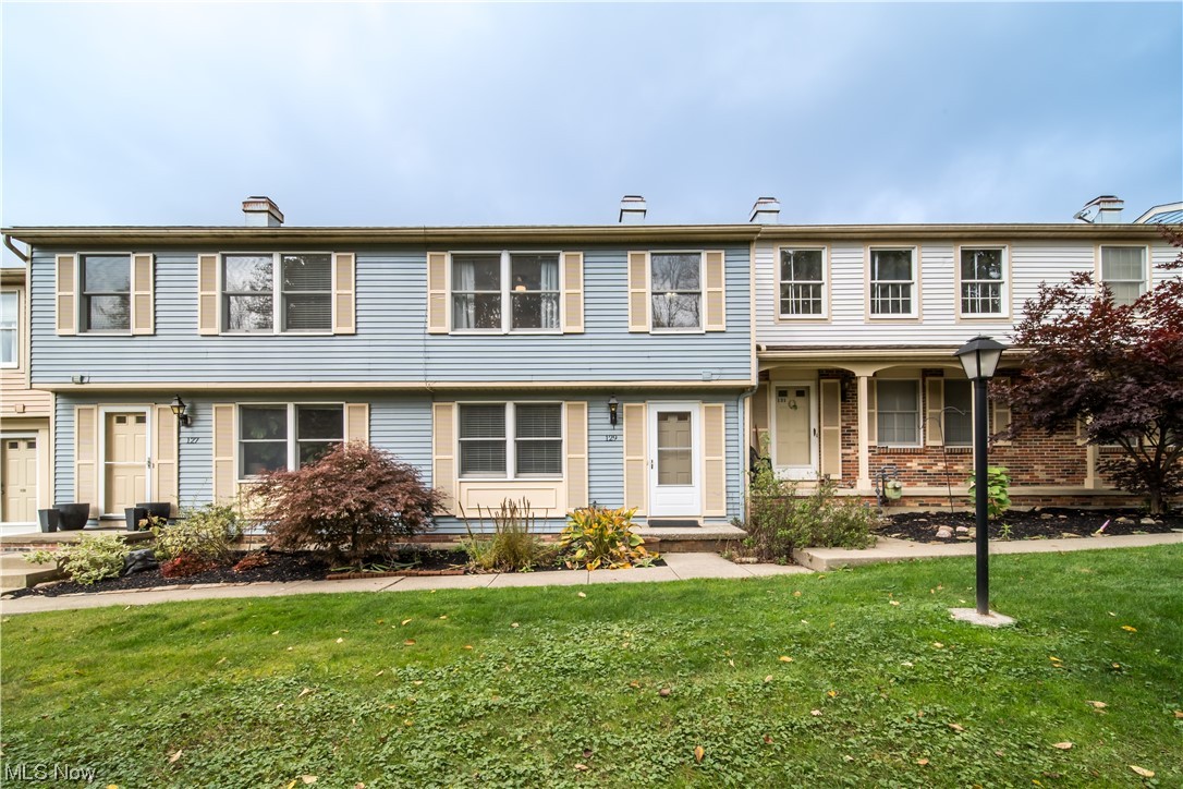 129 Quaker Ridge Drive Akron, OH 44313 - Photo 1 of 20 Multi unit property featuring a front yard