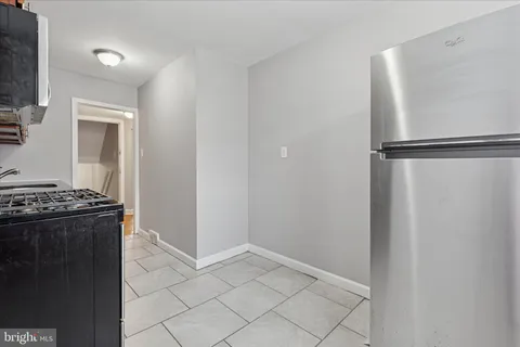 a view of a kitchen from the hallway