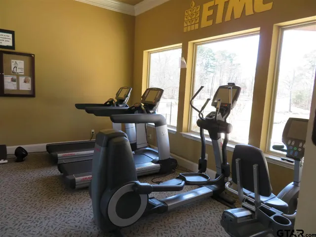 a view of a room with gym equipment