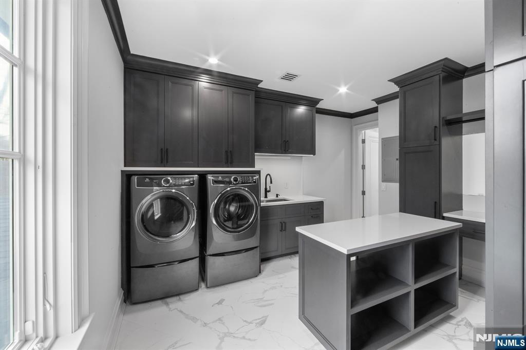 104 Chestnut Ridge Road Saddle River, NJ 07458 - Photo 43 of 47 a kitchen with a stove top oven and refrigerator