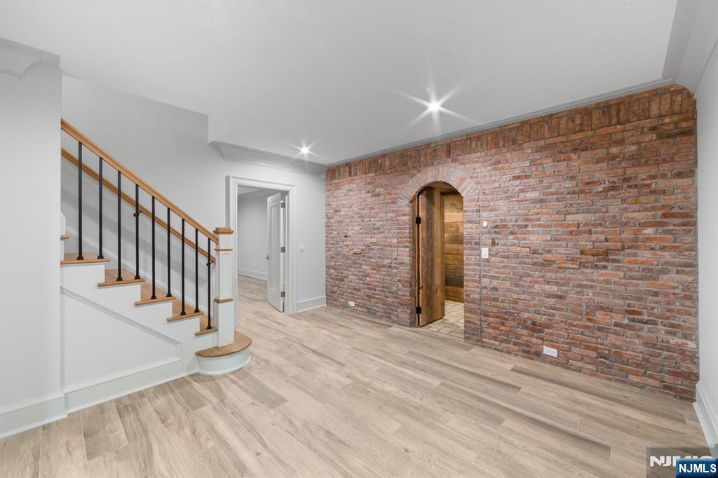 104 Chestnut Ridge Road Saddle River, NJ 07458 - Photo 44 of 47 a view of a hallway with staircase