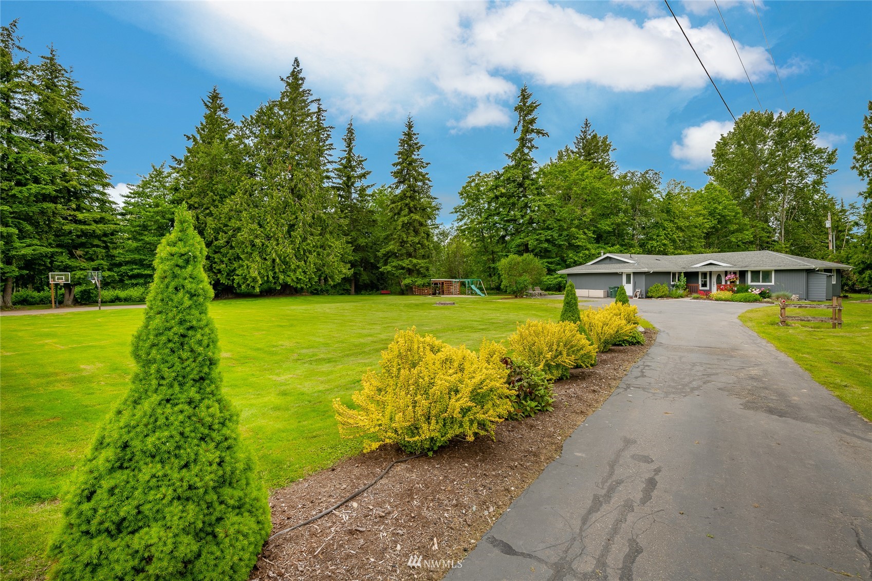 5577 E Road Bellingham, WA 98226 - Photo 20 of 40 a view of a swimming pool with a lake view