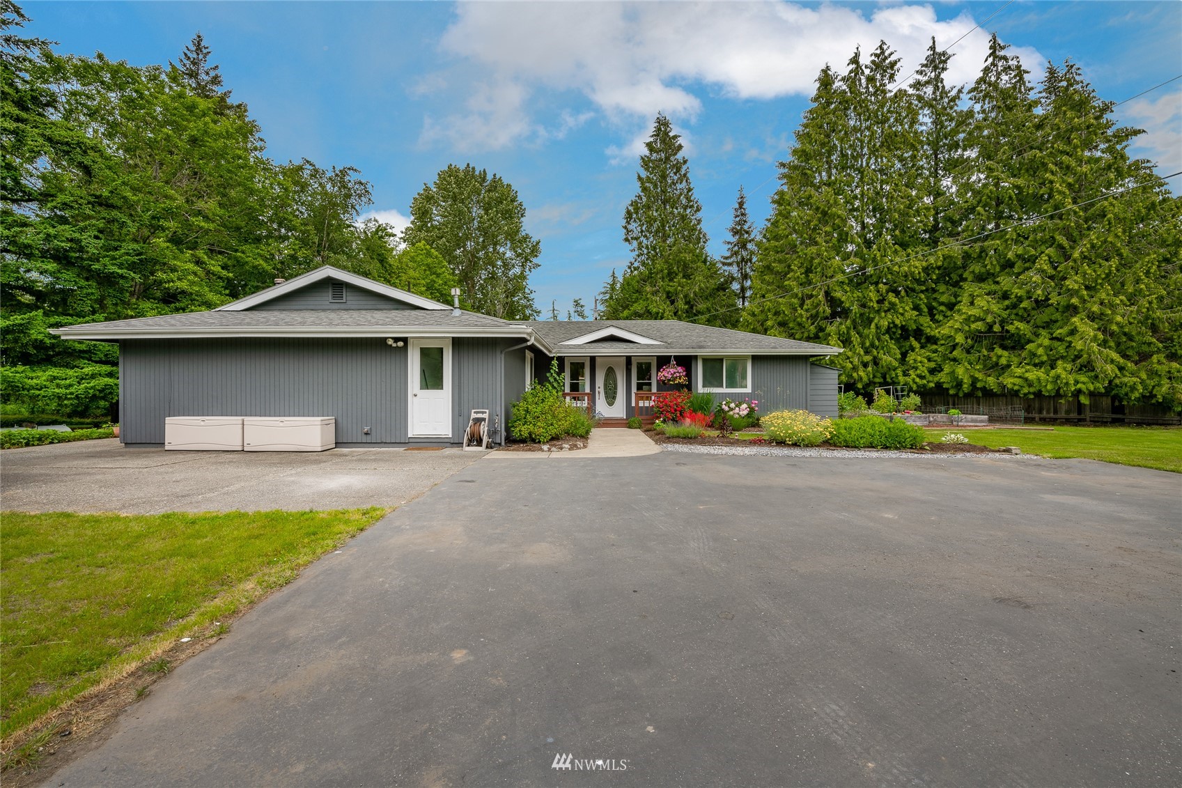 5577 E Road Bellingham, WA 98226 - Photo 24 of 40 a front view of house with yard and green space