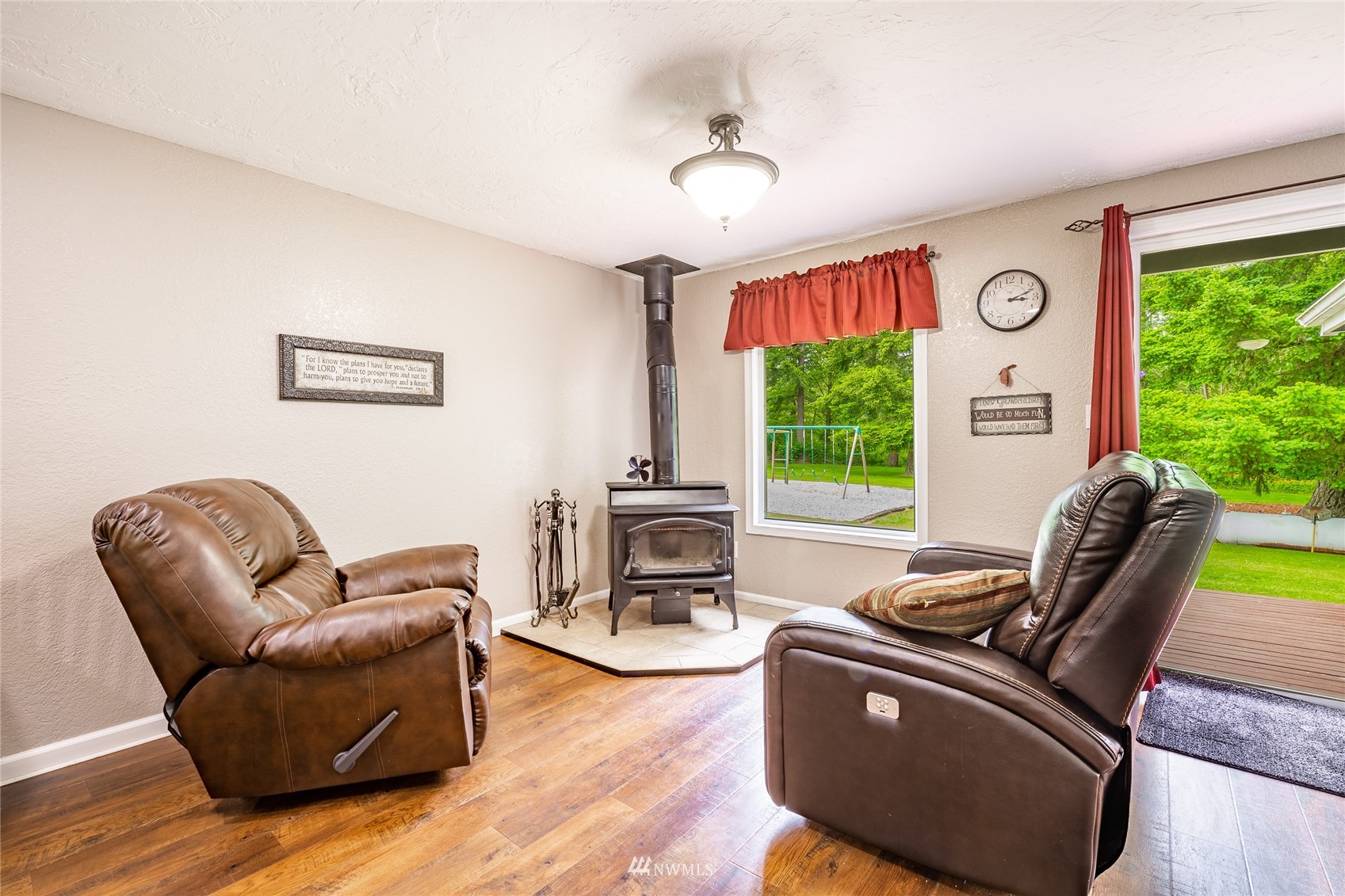 5577 E Road Bellingham, WA 98226 - Photo 33 of 40 a living room with furniture and a flat screen tv