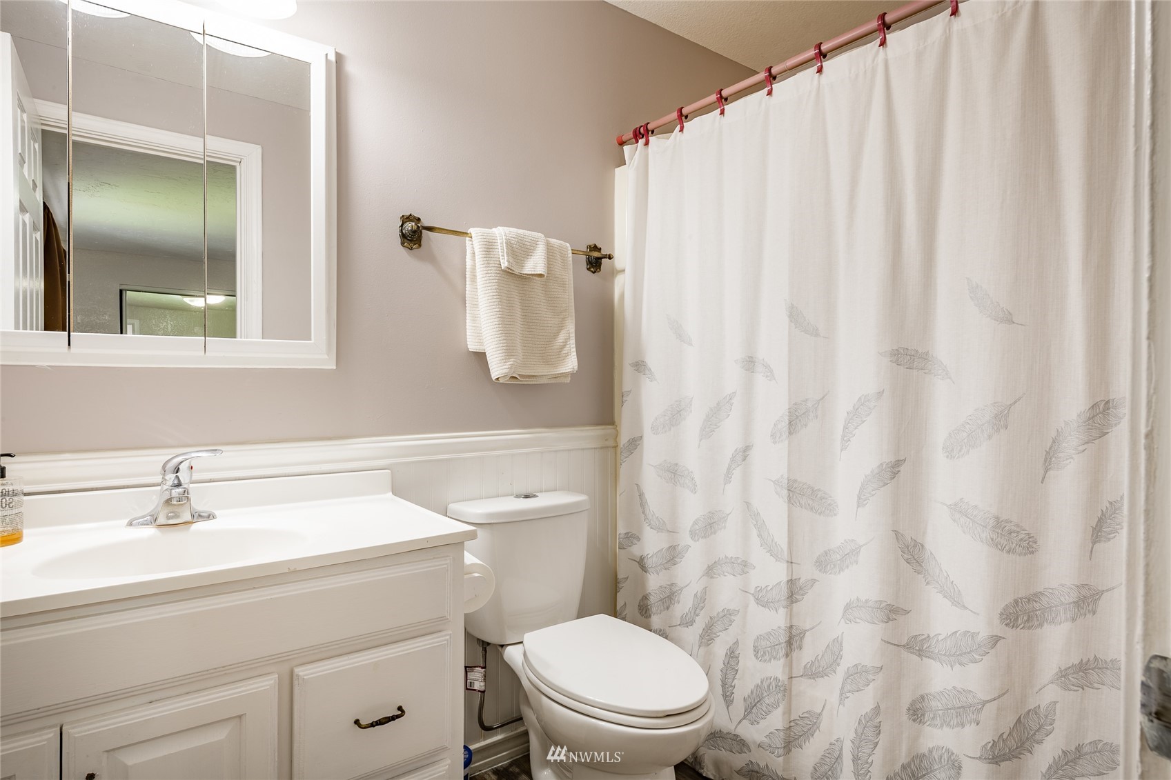 5577 E Road Bellingham, WA 98226 - Photo 39 of 40 a bathroom with a sink a toilet and shower