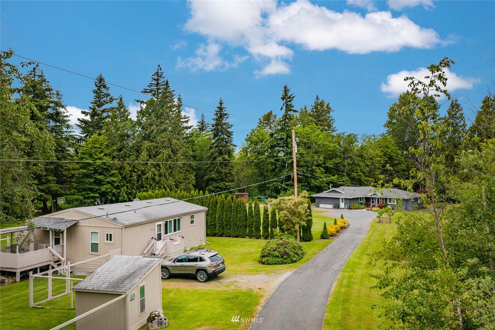 5577 E Road Bellingham, WA 98226 - Photo 5 of 40 a view of a swimming pool with a yard